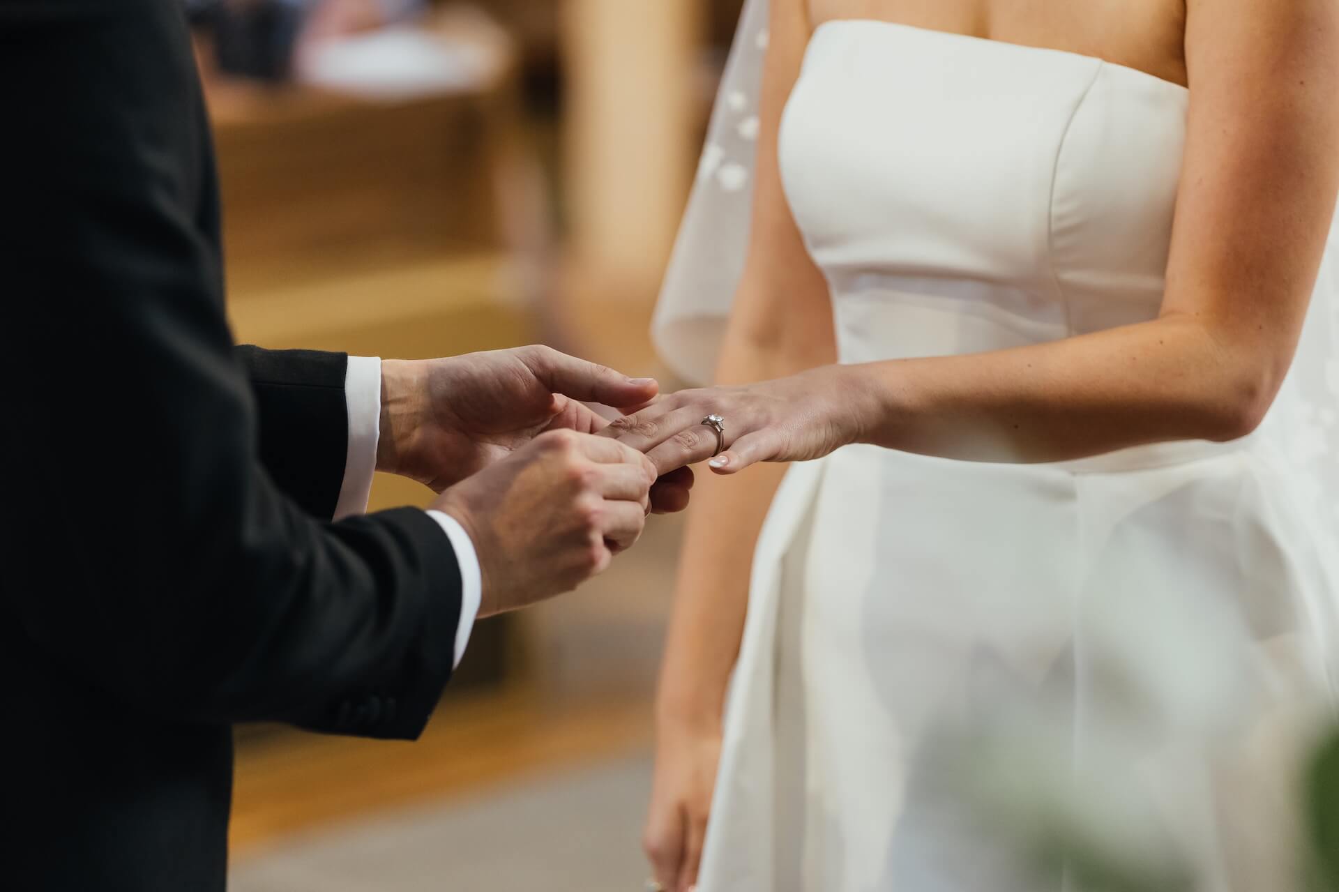 Bride & groom exchange wedding rings - Suffolk Church Wedding - Weddings By Mary