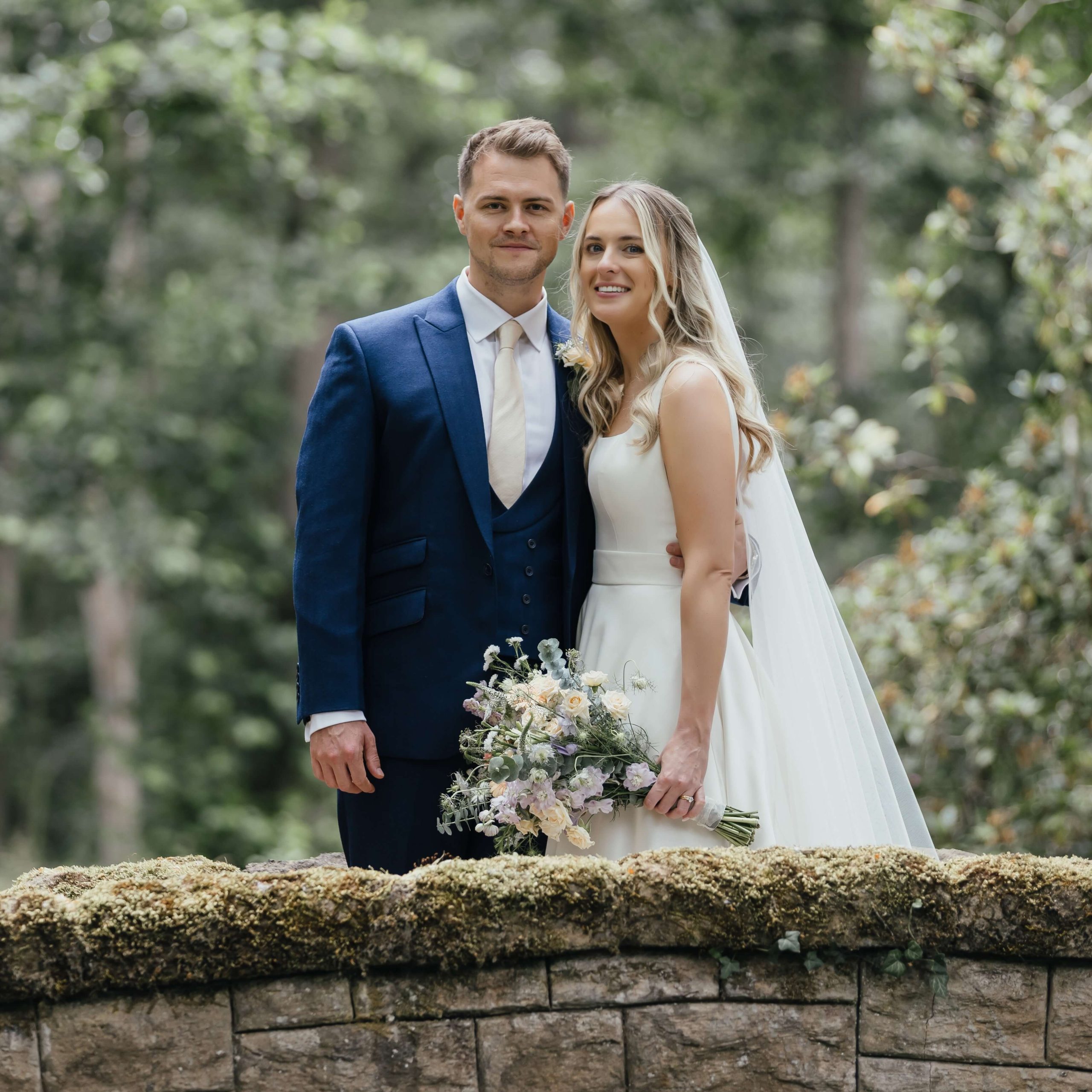 Bride and groom at their English Warwickshire countryside wedding in the UK Bride and groom at their English Warwickshire countryside wedding in the UK